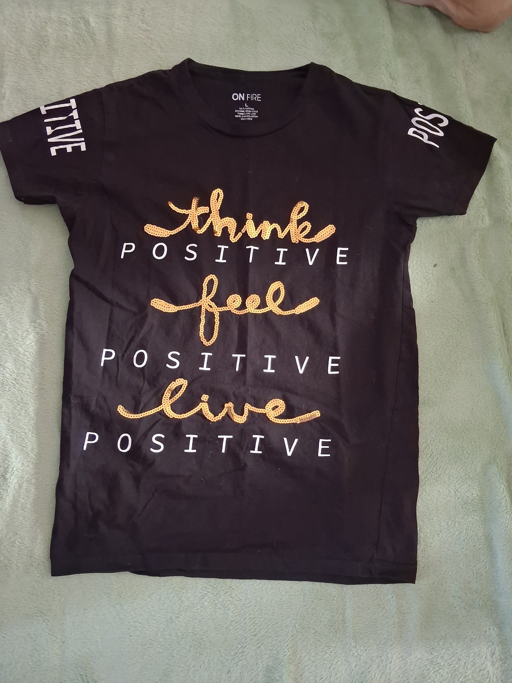 On Fire Black Tee with Gold Script and White Block Lettering